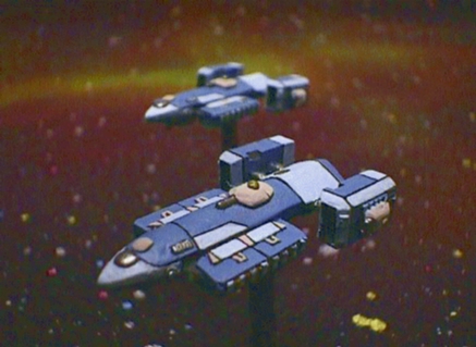Jpeg picture of RAFM's Close Escort from their Traveller line of spaceship miniatures.