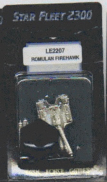 Jpeg picture of Task Force Games' 2200 Romulan Firehawk miniature in blister packet.