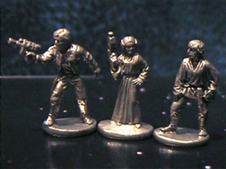 Jpeg picture of Star Wars Monopoly Limited Edition by Parker Brothers game pieces.