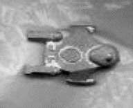 GIF picture of Task Force Games Starfire Cruiser miniature.