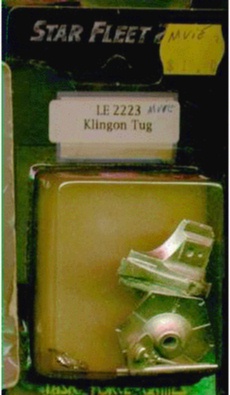 Jpeg picture of Task Force Games' 2200 Klingon Tug miniatures in blister package.