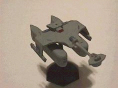 Jpeg picture of Task Force Games' 2200 Klingon Tug miniatures.
